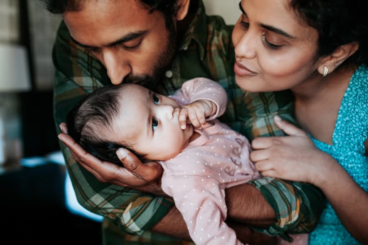A family bonds with their new baby